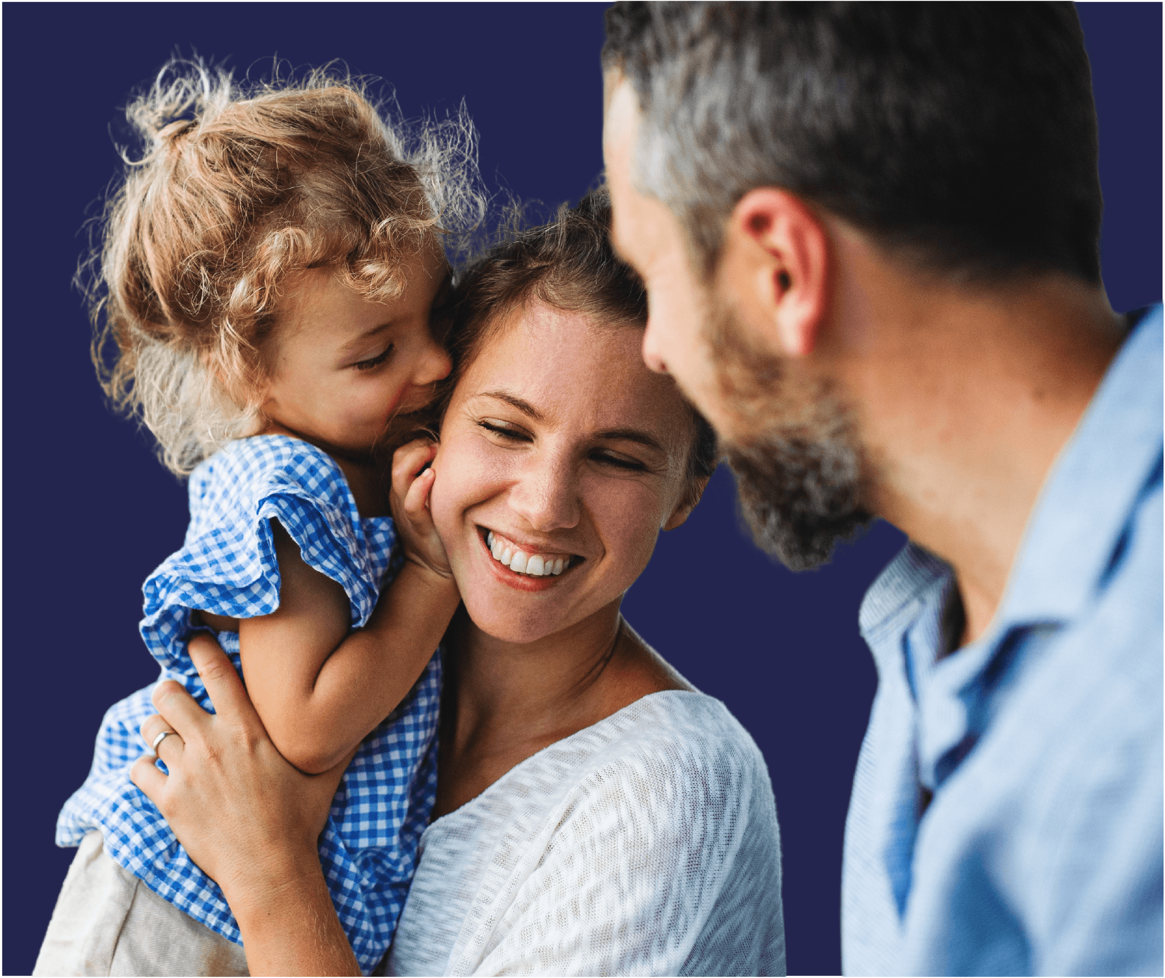 parents hugging a child