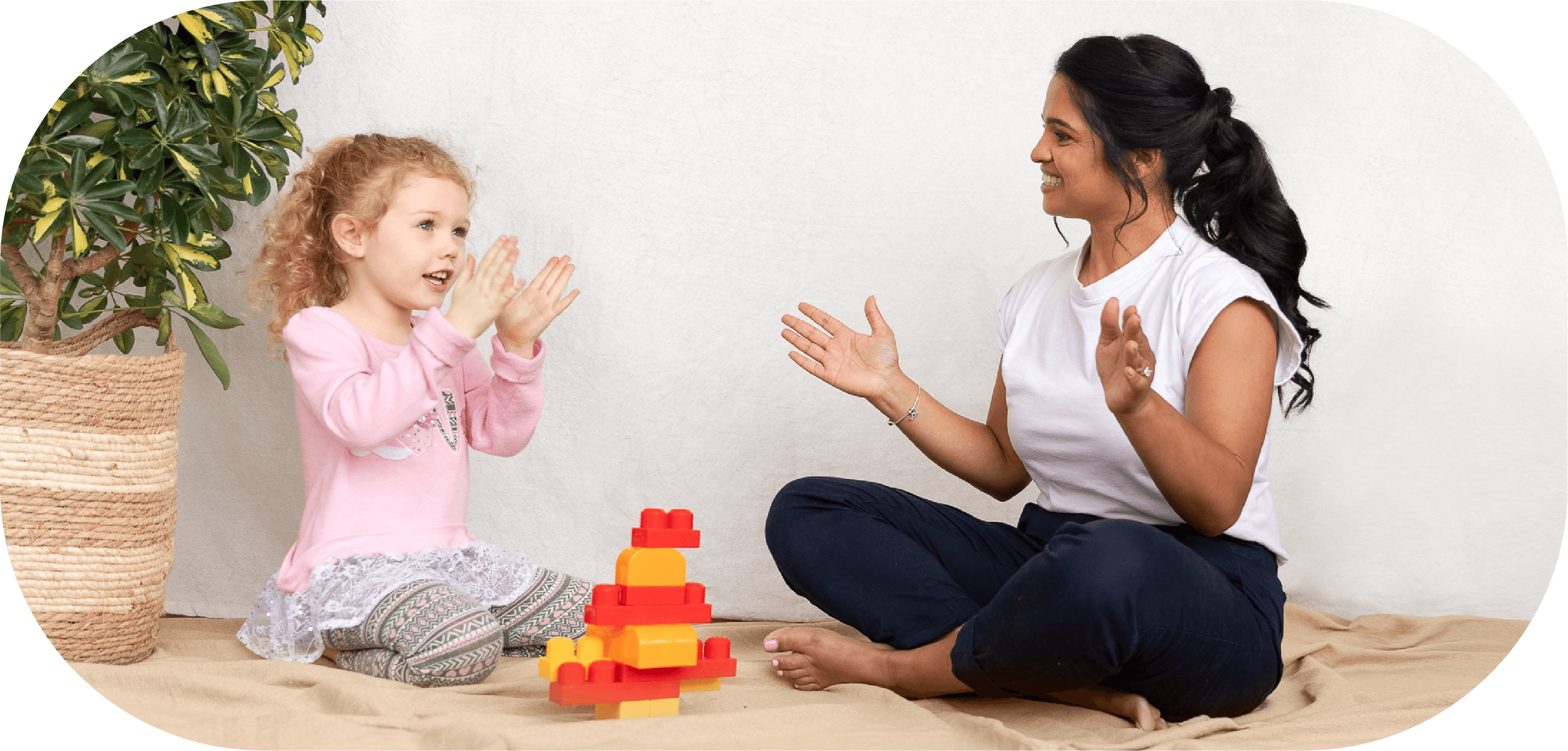 lady sitting with a kid
